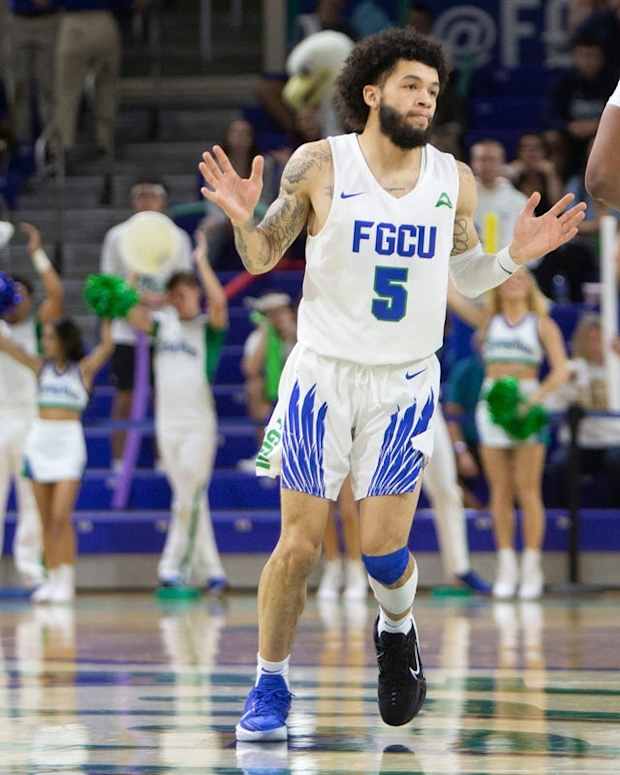 Florida Gulf Coast Eagles guard Tavian Dunn-Martin (5) celebrates during the second half of the NCAA men  s basketball game between the Rhode Island Rams and the Florida Gulf Coast Eagles, Tuesday, Nov. 23, 2021, at Alico Arena in Fort Myers, Fla. FGCU defeated Rhode Island 67-66.

Rhode Island at Florida Gulf Coast men's basketball